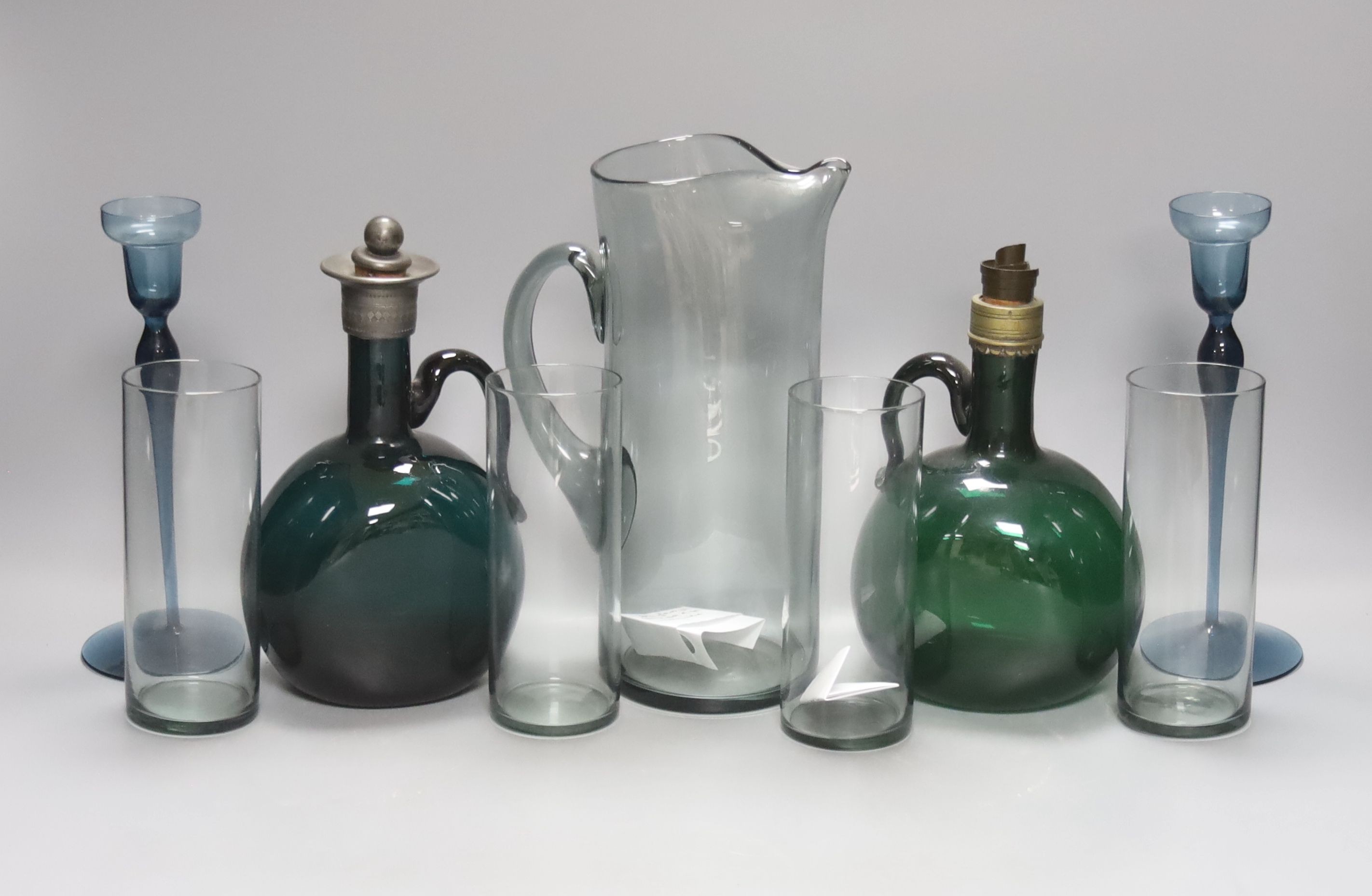 Two 19th century green glass hock jugs, a set of six Waterford cut glass tumblers and other glassware